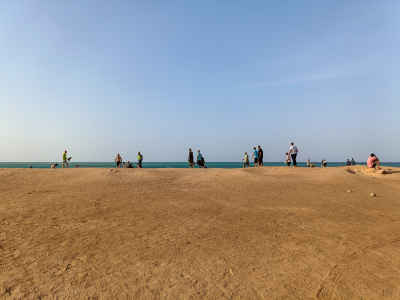 People Walking on Sandy Beach, Hurghada Red Sea
