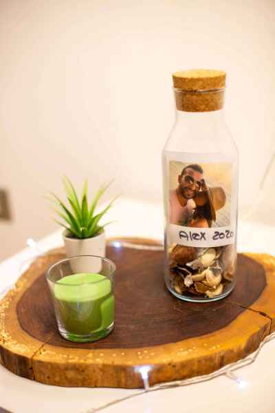 A handmade bottle with a family photo inside