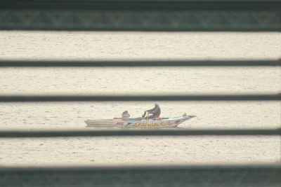 Fishing Boat on the Nile Seen Through a Bridge in Cairo