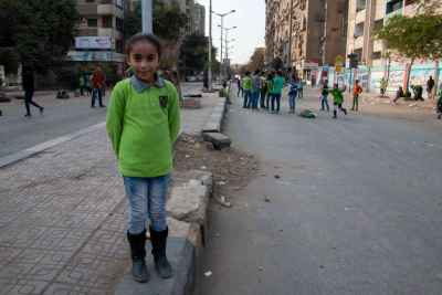 Egyptian Schoolgirl on Sudan Street Median, Cairo