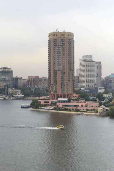 Boat on the Nile River with Cairo Skyline