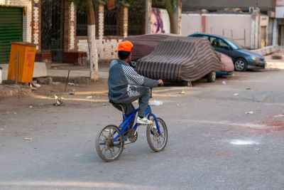 Boy Riding Blue Bicycle, Sudan Street, Cairo