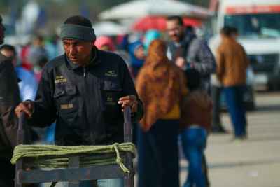 Cairo International Book Fair 2017 Worker Pushing Cart