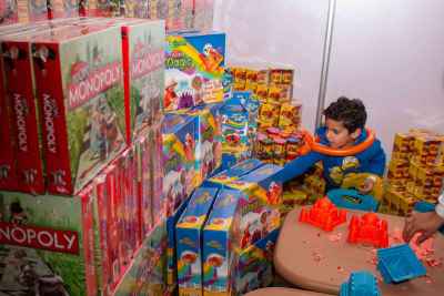 Boy Playing with Sand Molds at Cairo Toy Event