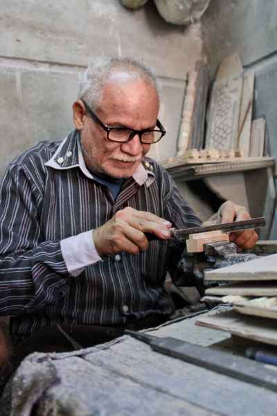 Traditional Egyptian Wood Carver in Egypt – Handmade Craftsmanship in Historic Cairo