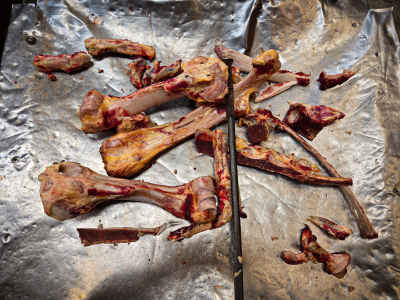 Leftover Bones on the Butcher’s Table After Eid Preparation