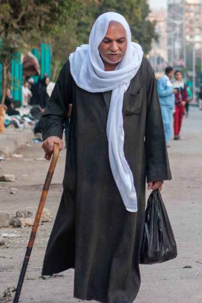 Elderly Egyptian Man Walking Cairo Street, 2017