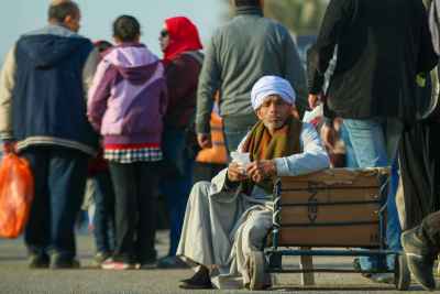Elderly Porter Resting at Cairo International Book Fair Egypt 1
