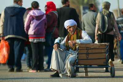 Elderly Porter Resting at Cairo International Book Fair Egypt 2