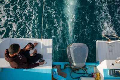 Fisherman on a Boat at Sea