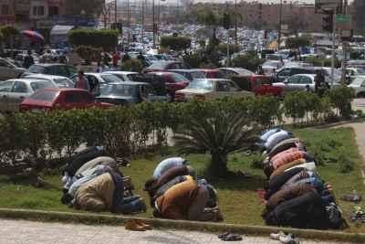 Friday Prayer at the Car Market in Nasr City – A Spiritual Scene Amidst Urban Hustle