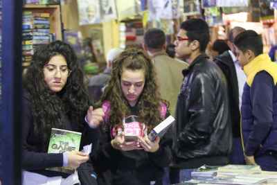 Girls Browsing Books at Cairo International Book Fair 2017 2