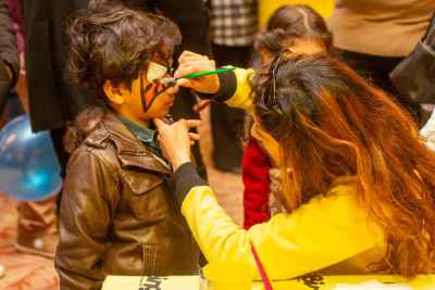 Face Painting Activity for Child at Cairo Community Event