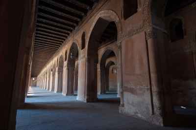 Interior view showcasing the architectural beauty of Ahmad Ibn Tulun Mosque in Old Cairo, Egypt 2