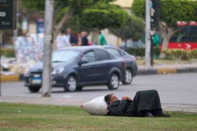 Man Resting on Grass in Cairo