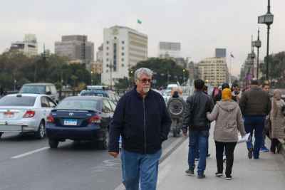Man Walking on Kasr el Nil Bridge in Cairo 2
