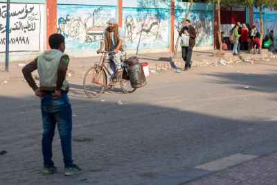 Cairo Labbaan Cycling with Metal Milk Canisters