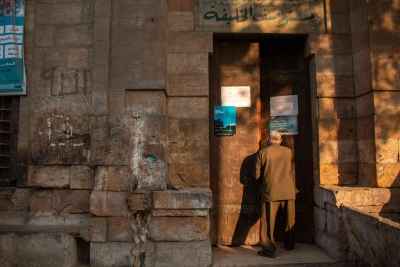 Elderly Man Entering Historic Mosque, Al-Ashraf Street, Cairo