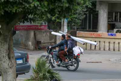Motorcycle Carrying Long Pipes, Cairo Winter 2017 - 2