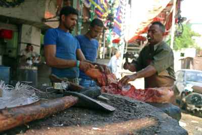 Butchers Cutting Fresh Meat, Eid Al-Adha, Cairo