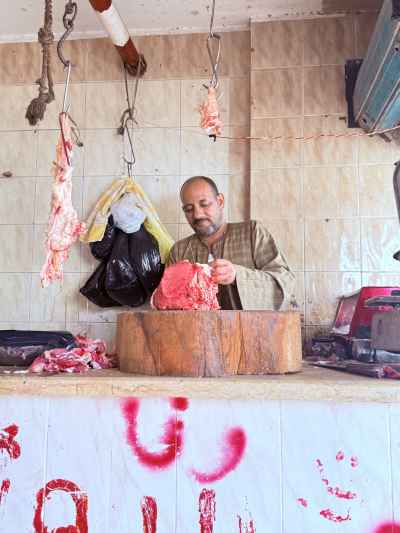 Egyptian Butcher Preparing Meat Before Eid