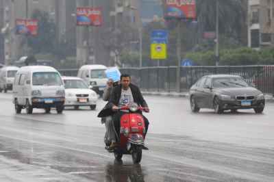 Red Scooter Commute in Cairo