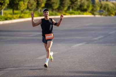 Runner Celebrating During a Marathon in Cairo