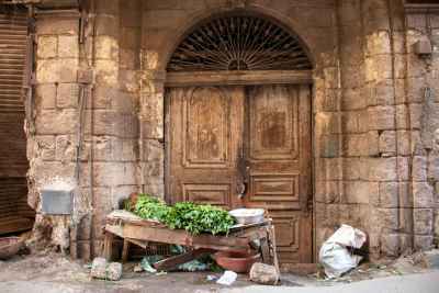 Vegetable Stall Outside Historic Stone Doorway, Islamic Cairo