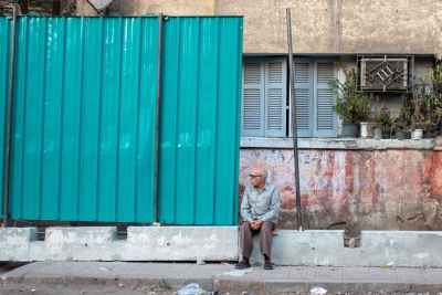Elderly Man Resting on Sudan Street, Cairo Metro Construction 2017