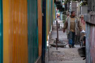 Man Walking Sudan Street Alley During Metro Construction 2017
