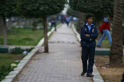 Schoolboy Walking to Class in Heliopolis (Masr el Gedida), Cairo