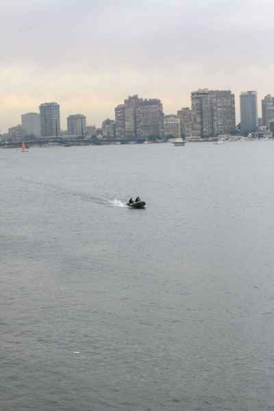 Small Boat on the Nile Cairo Skyline