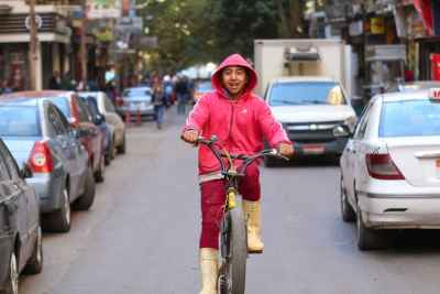 Smiling Cyclist in Red Hoodie – Cairo Winter 2017 - 2