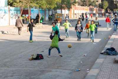 Children Playing Street Football, Sudan Street Cairo