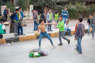 Children Playing Street Football on Sudan Street Cairo
