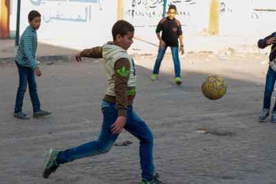 Boys Playing Street Football, Sudan Street Cairo 2017