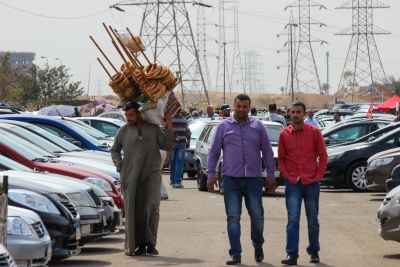 Street Vendor Selling Simit and Dukka Carrying His Basket in Cairo, Egypt