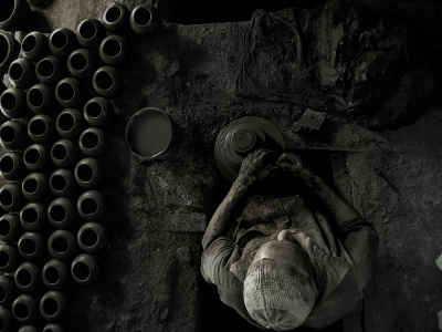 Egyptian Pottery Craftsman Shaping Clay in Monufia, Top View
