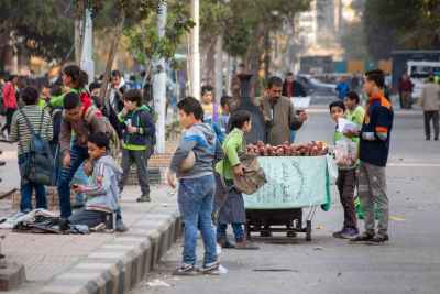 Sweet Potato Street Vendor Serving Schoolchildren, Sudan Street Cairo