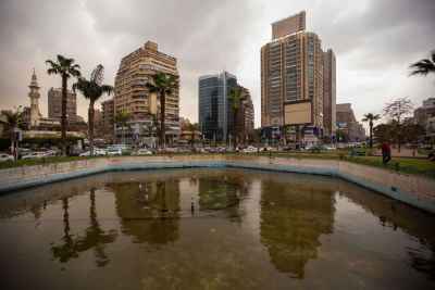 Urban Pond Surrounded by Tall Buildings in Cairo