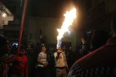 Young Men Performing Fire and Aerosol Spray Dance at Al-Hussein Mawlid – Cairo, Egypt 2