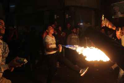 Young Men Performing Fire and Aerosol Spray Dance at Al-Hussein Mawlid – Cairo, Egypt 3