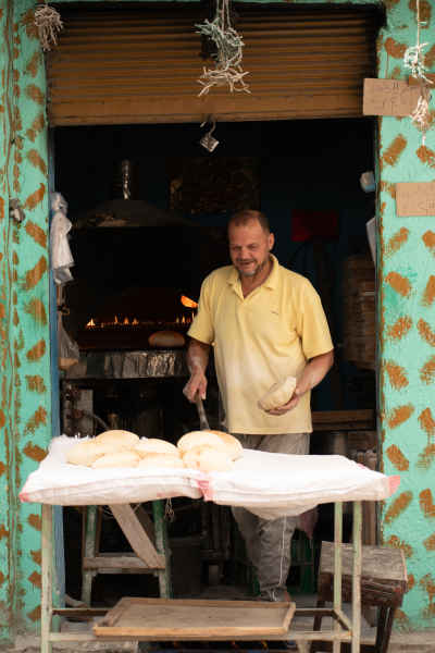 The baker at the baladi bread oven — Kom El-Dekka, Alexandria.
