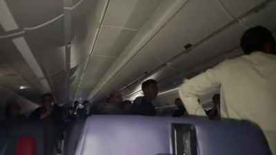 Egyptian Passengers Watching Football Match on EgyptAir Flight