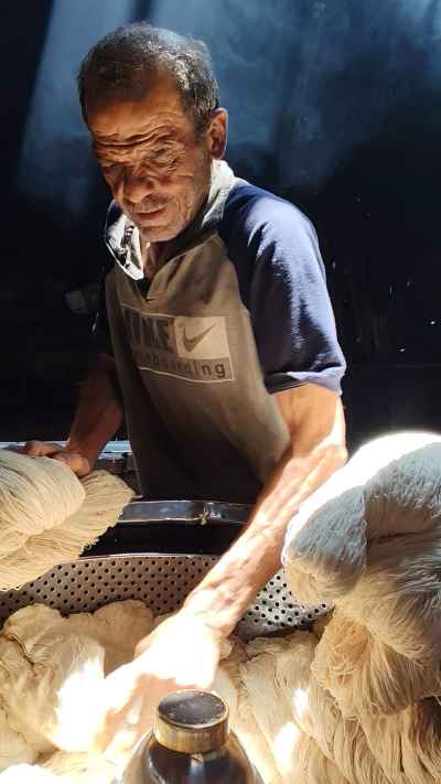 Craftsman Preparing Yarn at Masbaghet Am Salama, Darb Al-Ahmar