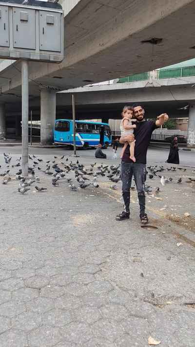 Father and Child Feeding Pigeons, Abdel Moneim Riad Square