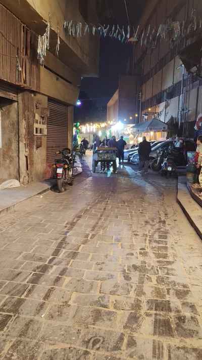 Egyptian Alley Night Scene with Beleila Street Vendor