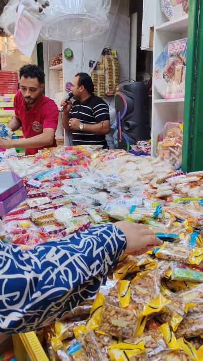 Moulid Sweets Vendor Husam Shouma Calling Prices, Cairo