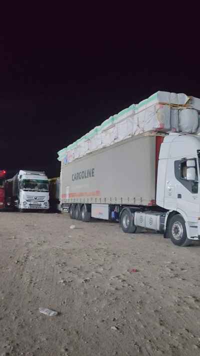 Heavy Cargo Trucks Parked at Night Rest Stop, Sohag