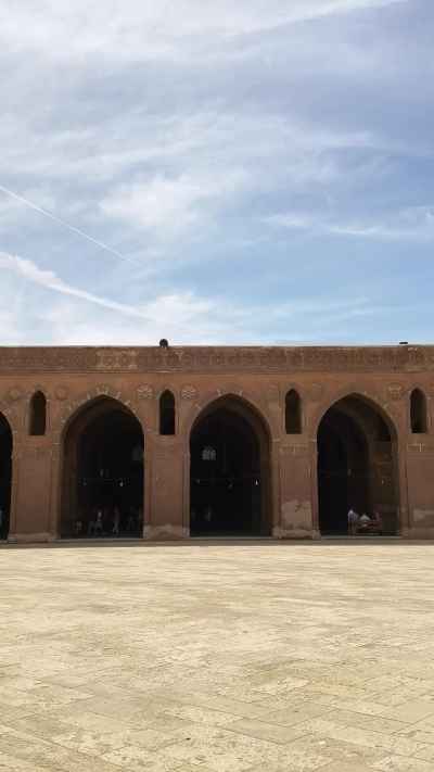 Visitors at Historic Cairo Mosque Open Courtyard